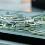 Close-up view of a futuristic architectural model showcasing urban design elements.
