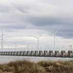 Panoramic view of wind turbines at Oosterscheldekering dam in Zeeland, Netherlands.
