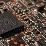 Detailed close-up of a computer circuit board showcasing electronic components.