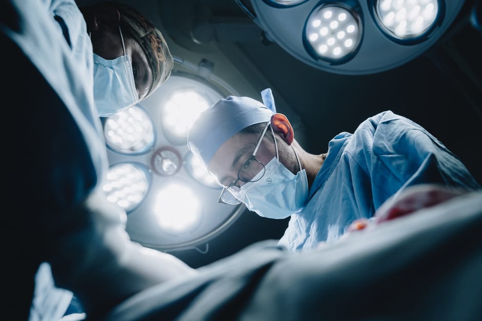 Surgeons performing a procedure in a state-of-the-art operating room in Mexico.