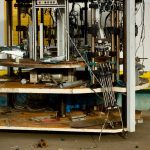 Detailed view of complex industrial machinery featuring metal components and wiring.