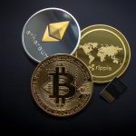 A striking image of Bitcoin, Ethereum, and Ripple coins illustrating modern digital currency.