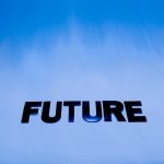 The word 'Future' in bold letters against a bright blue abstract background.