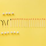 Burned and unburned matches arranged on a yellow background spelling 'Stop Burnout'.