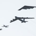 A striking formation of military aircraft captured over Miami, FL, showcasing aviation prowess.